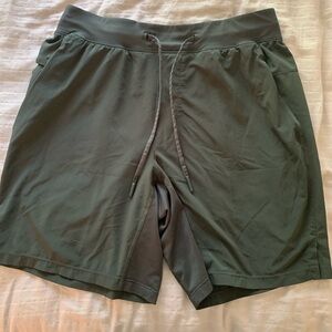Men’s Lululemon green shorts.